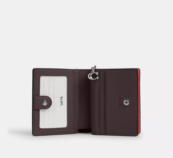 BILLETERA PEQUEÑA COACH SNAP CUERO