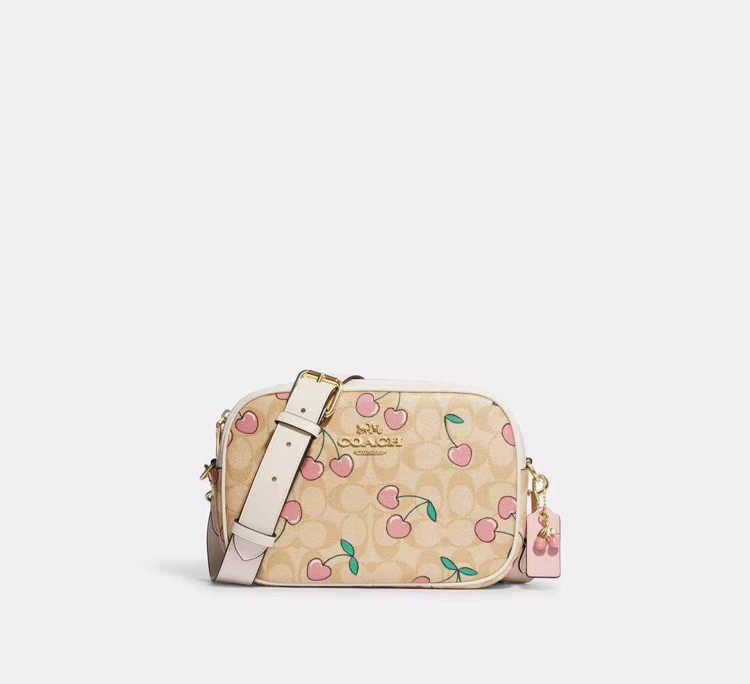 MANOS LIBRES COACH JAMIE SIGNATURE CANVAS CEREZAS