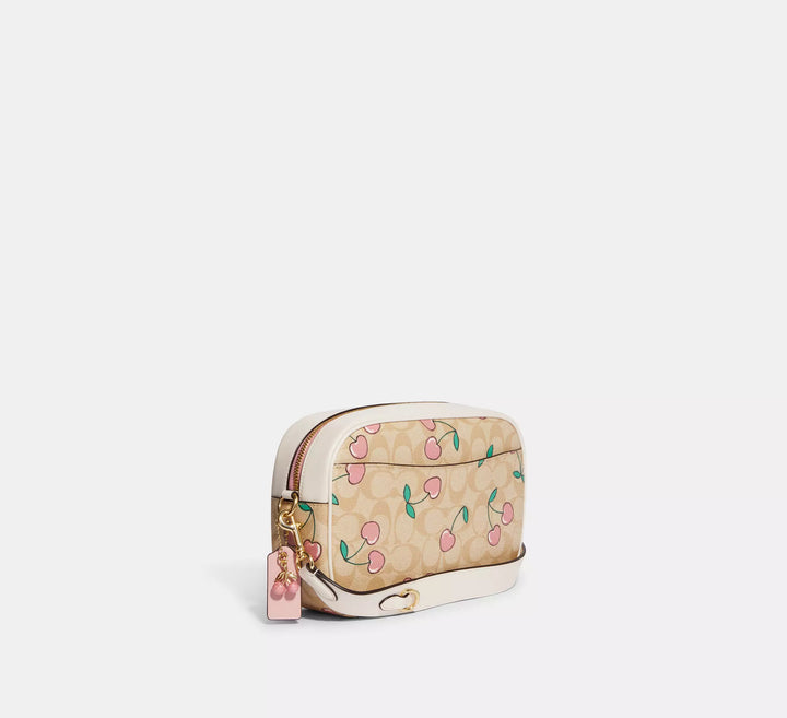 MANOS LIBRES COACH JAMIE SIGNATURE CANVAS CEREZAS