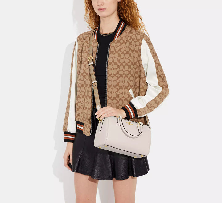 CARTERA COACH ROWAN CON CORREA CANVAS